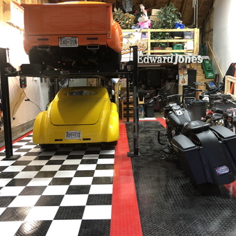 Custom Garage with Car Lift, Motorcycles, and Checkered Floor - Jeff from Owings, MD