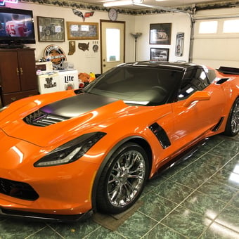 Orange Corvette and Wall Decor in Tiled Garage - Mike from Kokomo, IN