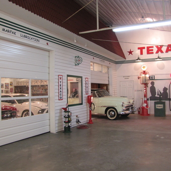 Classic Texaco Gas Pumps and Vintage Cars in Garage - Boyd