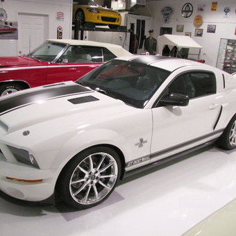 Classic Car Garage with Wall Signs and Mustang - Boyd
