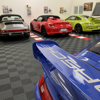 Luxury Garage With Porsche Cars and Race Tile Flooring - JOHANN from LA BAULE