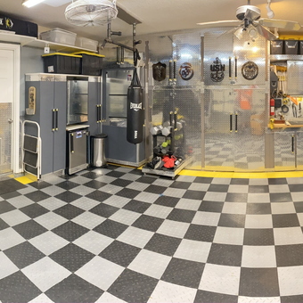 Organized garage with tool storage, bike racks, and workbench - Dee from Winter Springs, FL