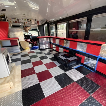 Custom Garage Bus Interior with Diamond Plate Cabinets - William