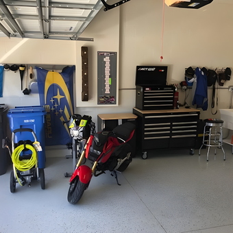 Organized garage with tool chest, scooter, and workbench - Walter from Coral Springs, FL
