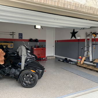 Organized garage with Can-Am, tool chest, and ladders - Jason from Rowlett, TX