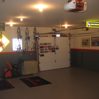 Organized garage with bike racks and neon signs - Phil from Florham Park, NJ
