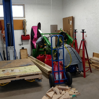 Organized garage with car lift, jack stands, and tools - Larry from Sun Prairie, WI