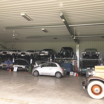 Multiple classic cars on car lifts in spacious garage - Jeffrey from Dublin, OH