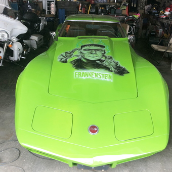 Green Corvette with Frankenstein Hood Art in Garage - junkyarddogshop from Pittsburg, KS