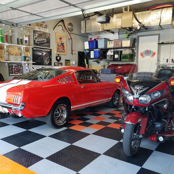 Organized garage with classic car, motorcycle, and wall storage - Ron from Ocean Pines, MD