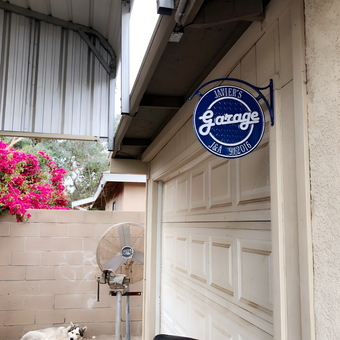 Custom garage sign and vintage fan outside garage - Araceli from Fontana, CA