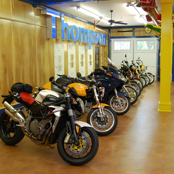 Custom garage with multiple motorcycles and wood panel walls - Randy from Cartersville, GA
