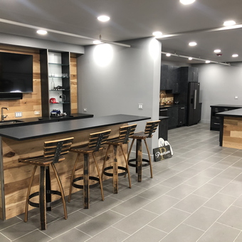 Modern garage bar with wood accents and seating - Swan from Napervy, IL