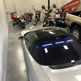 Garage with Classic Motorcycles and Sports Car - Swan from Napervy, IL