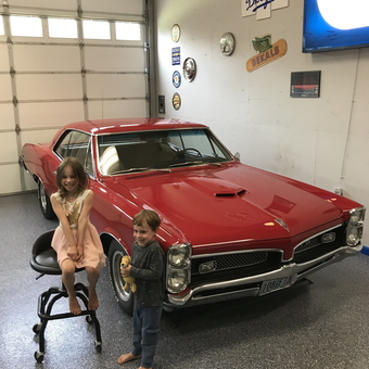 Classic Red Pontiac with Wall Signs and Garage Stool - Mike from Warren, OR