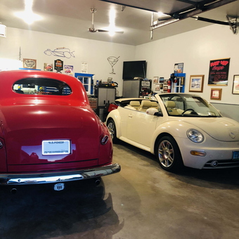 Classic Red Coupe and VW Beetle in Decorated Garage - Curti from Rapid City, SD