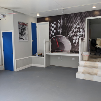 Garage with Racing Wall Mural and Shelving - Jim from Novato, CA
