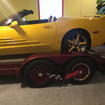 Yellow Corvette on Red Car Trailer in Garage - Billy from North Little Rock, AR