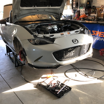 Mazda Miata on Lift with Tools in Organized Garage - Mark from West Bridgewater, MA