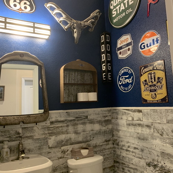Garage Bathroom with Vintage Car Signs and Decor - Dana from Blue Ridge, TX