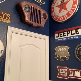 Garage wall with Jeep signs and Texaco decor - Dana from Blue Ridge, TX