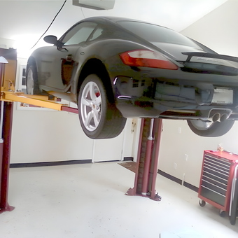 Garage With Car Lift and Tool Chest - Dick's Porsche Land from Roswell, GA