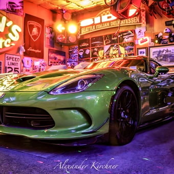 Green sports car with neon signs in garage - Dave from Auburn, WA