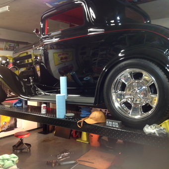 Classic Car on Lift with Garage Tools and Decor - Roid from Kitchener