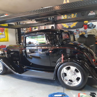 Classic Car with Four Post Lift and Garage Decor - Roid from Kitchener