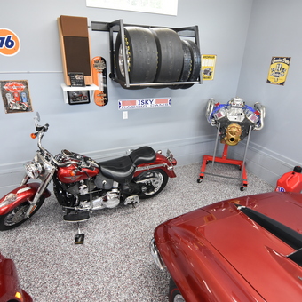 Garage with Harley, classic car, wall racks, and signs - Bob from Millsboro, DE