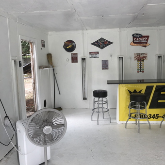 Garage Decor with Stools, Signs, and Fan - Rusty from Monroe, NC