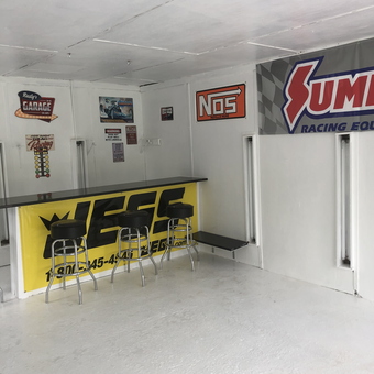 Garage Bar Area with Racing Signs and Stools - Rusty from Monroe, NC