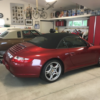 Organized garage with red Porsche and storage cabinets - Jeff from Sebastopol, CA