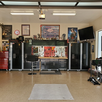 Organized garage with cabinets, tool chest, and workbench - G2INC. from Prescott, AZ