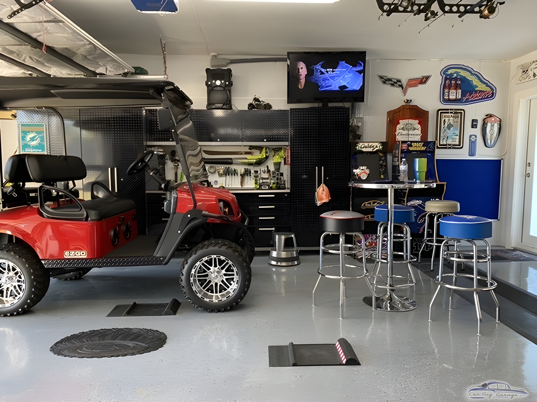 Organized garage with golf cart, bar stools, and storage - L from Cutler Bay, FL