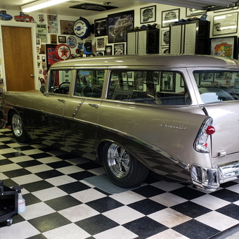Classic Car Garage With Checkered Floor and Wall Decor - Dumb--- from bremerton, WA