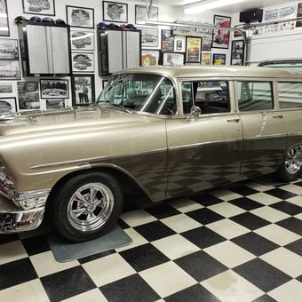 Classic car in checkered floor garage with wall cabinets - Dumb--- from bremerton, WA