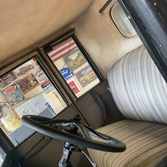 Vintage car interior with classic garage signs - Lizzy from Nekoosa, WI