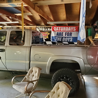 Truck, Banners, and Chairs in Organized Garage - REAFER from Thomson, IL