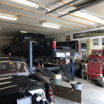 Organized garage with car lift and tool chests - Frozenbon from Ottawa Canada