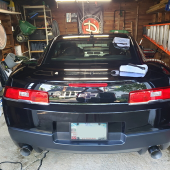 Organized garage with Camaro, ladders, and detailing supplies - Rick from Cuyahoga Falls, OH