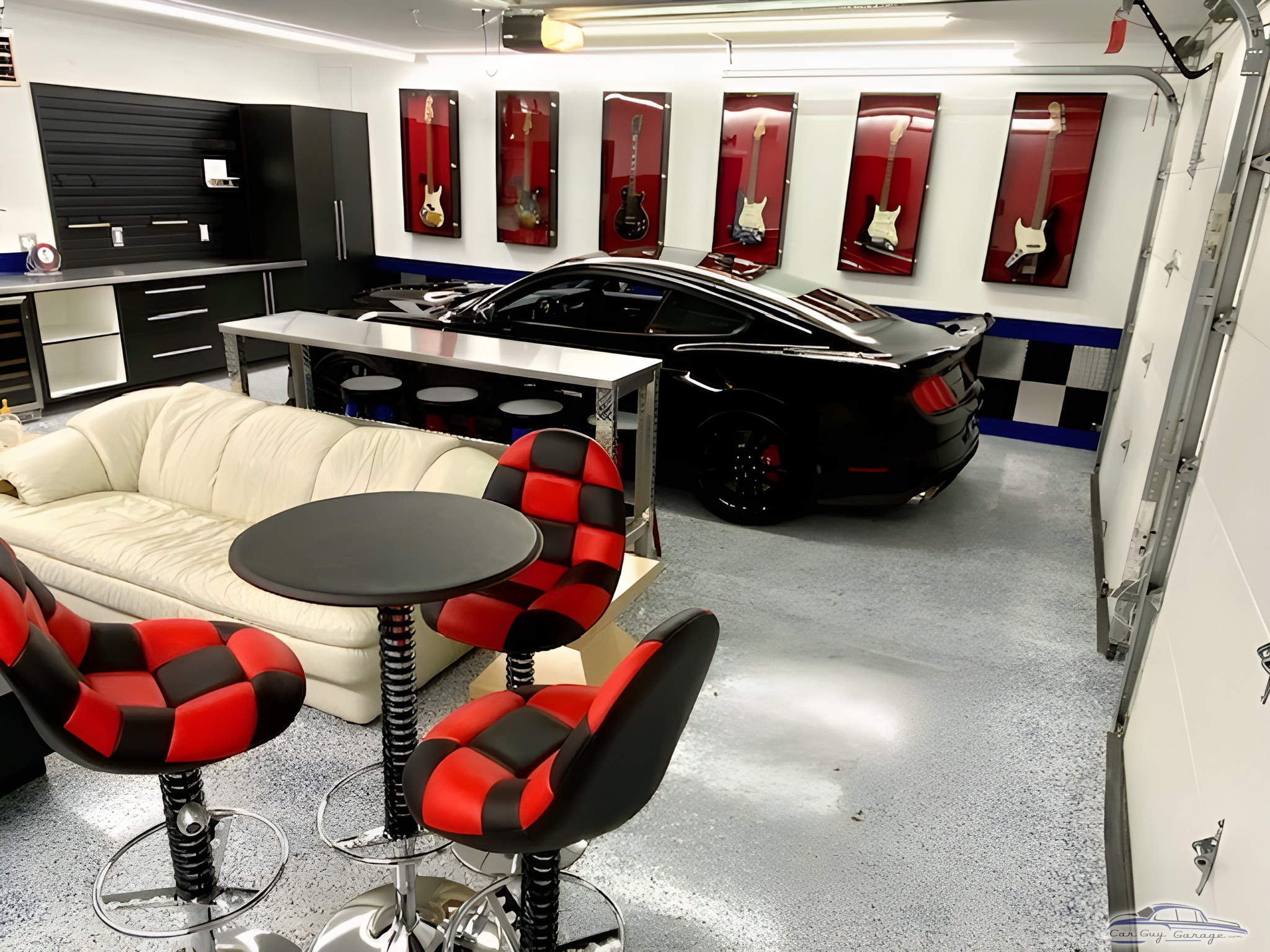 Modern Garage with Black Cabinets and Red Bar Stools - Bruce