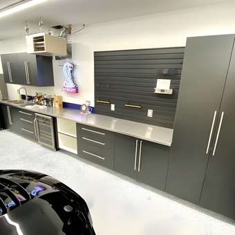 Modern Garage Cabinets With Stainless Countertop and Slatwall - Bruce