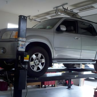 SUV on Four Post Garage Lift - New Lift from Woodbine, NJ