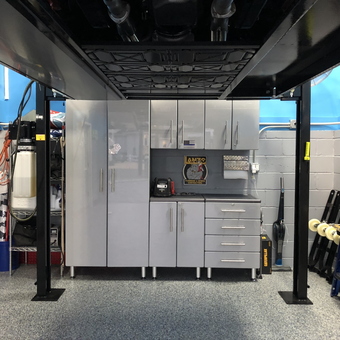 Modern garage with storage cabinets and car lift - Doug from NJ