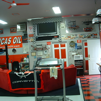 Corvette Themed Garage With Red Cabinets And Decor - 2008 Vette