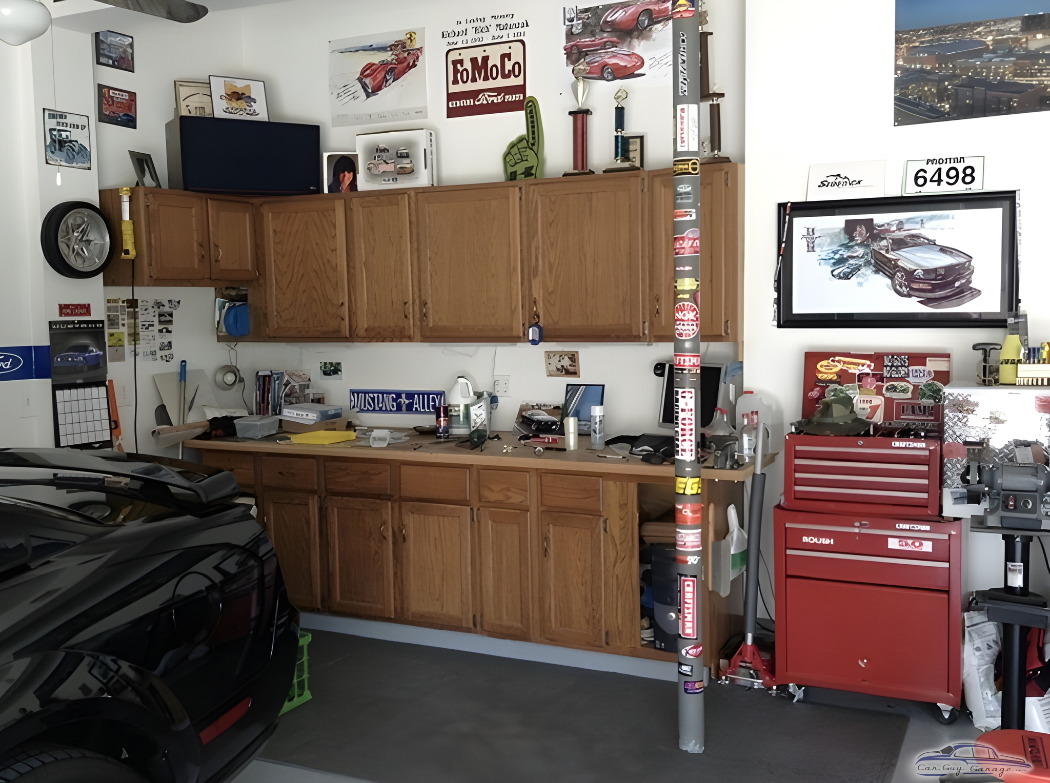 Organized garage with red tool chest and cabinets - Mark from Sunbury, OH