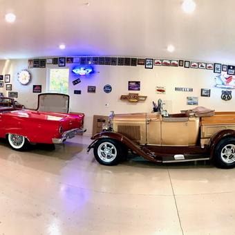 Classic Car Garage with Red Cabinets and Wall Decor - Ivan from Grove, OK