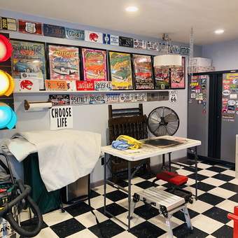 Car-themed garage with decor, tools, and collectibles - Charlie from Mobile, AL