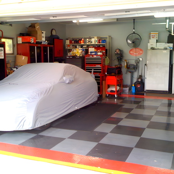 Organized garage with car cover, tool cabinets, and flooring - Marty from Elkhart, IN